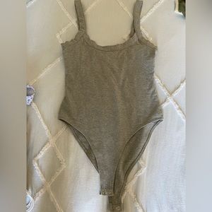 grey bodysuit